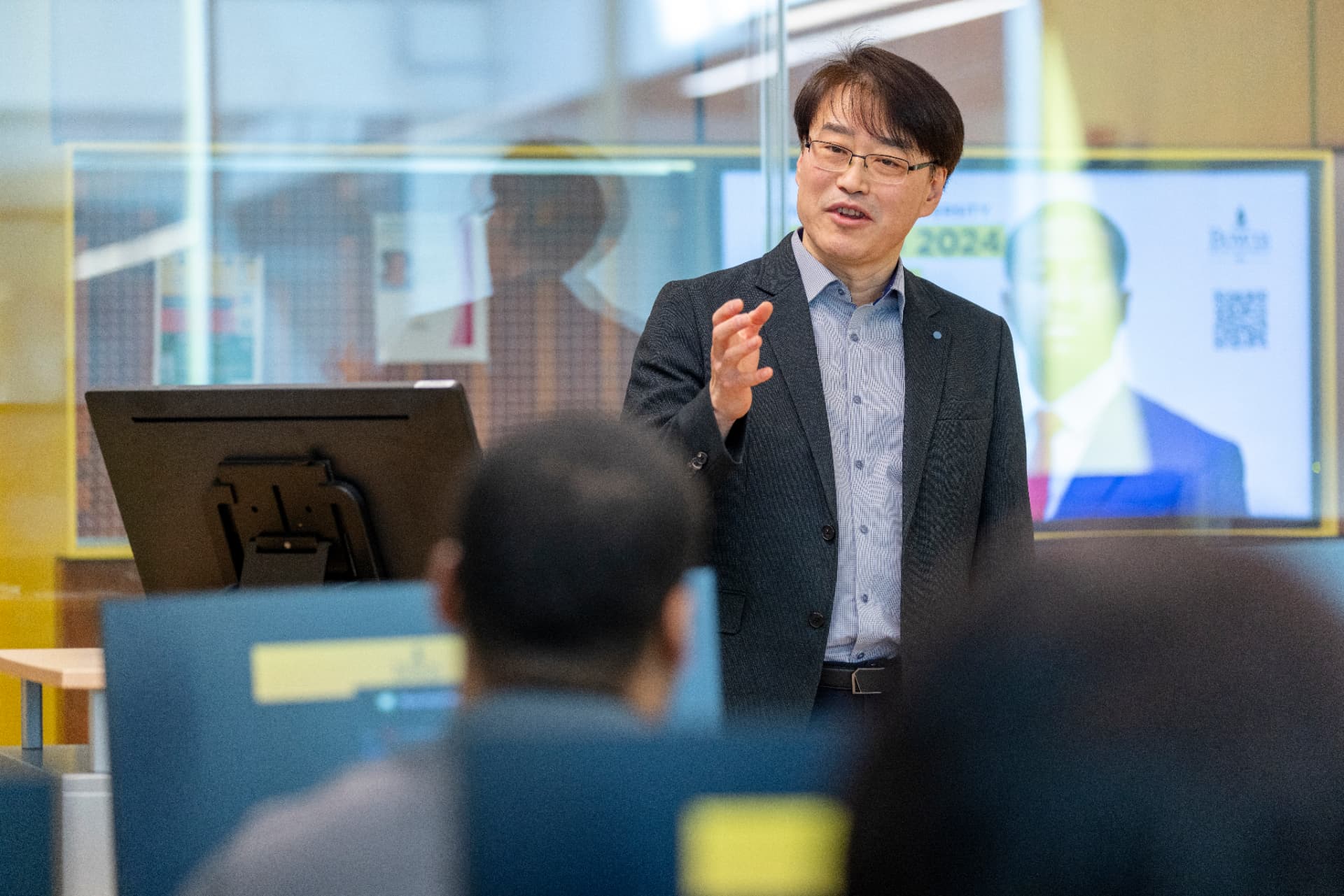 A speaker presenting to a Bowie State audience