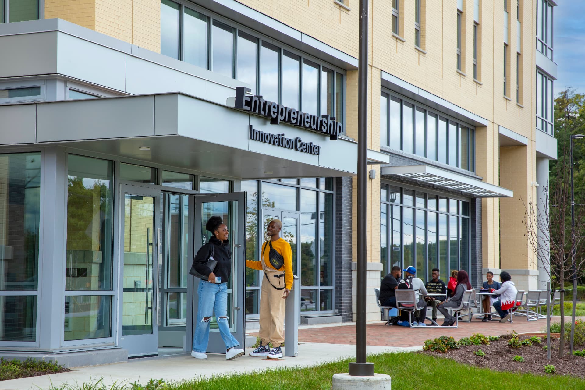 Students outside the Entrepreneurship Innovation Center at Bowie State